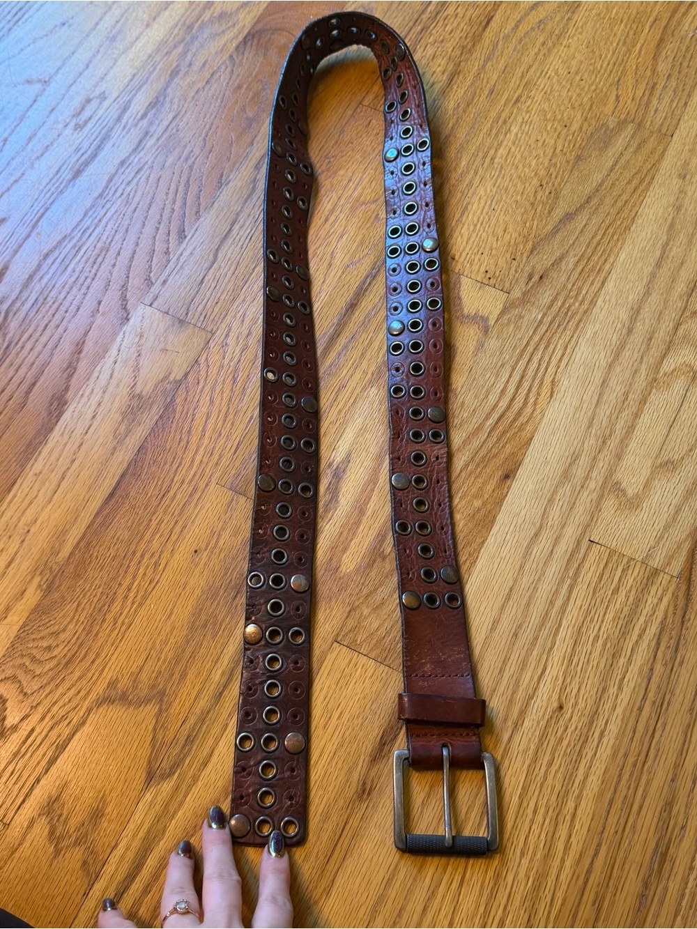 Vintage studded brown belt size large with grommet details real leather